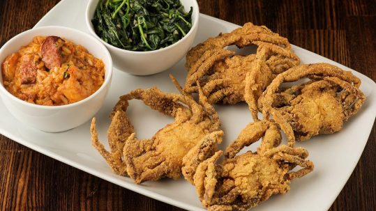 Fried crabs, yams, and sauteed spinach from Harold and Belle's Cajun and Creole
