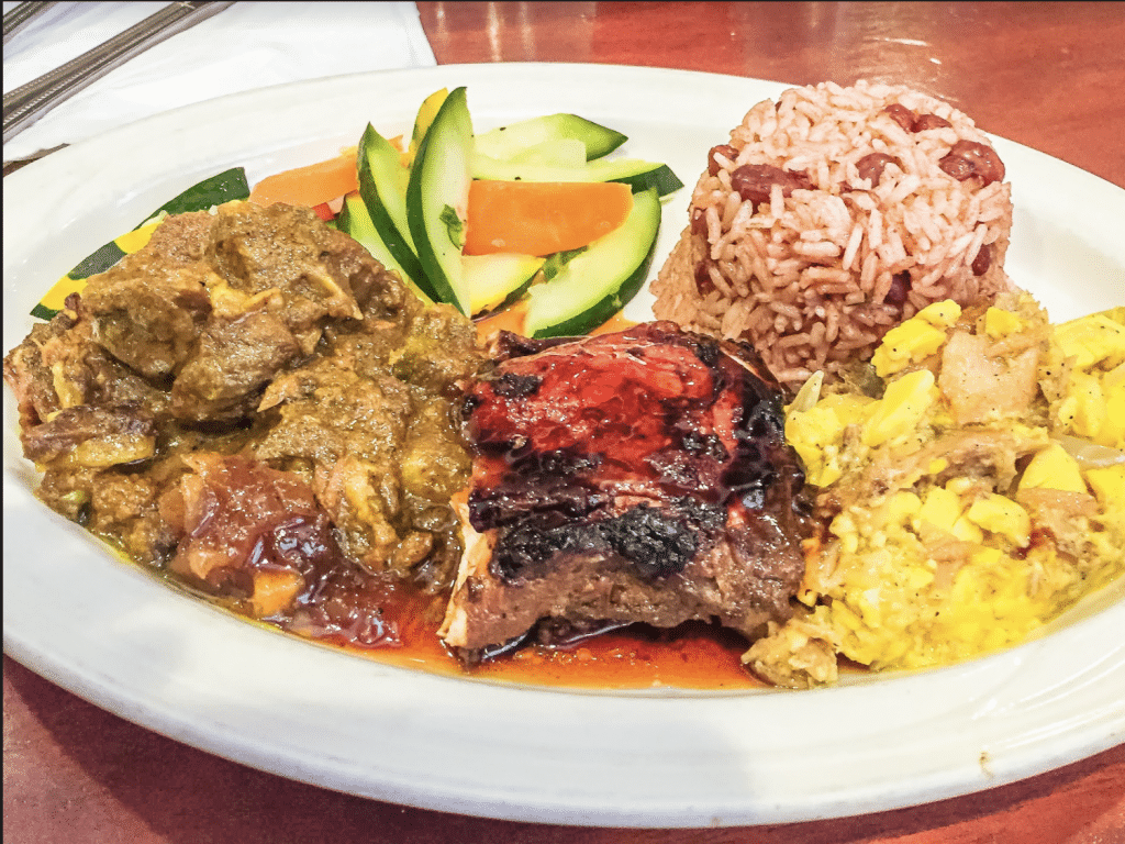 A plate of Jamaican food. 