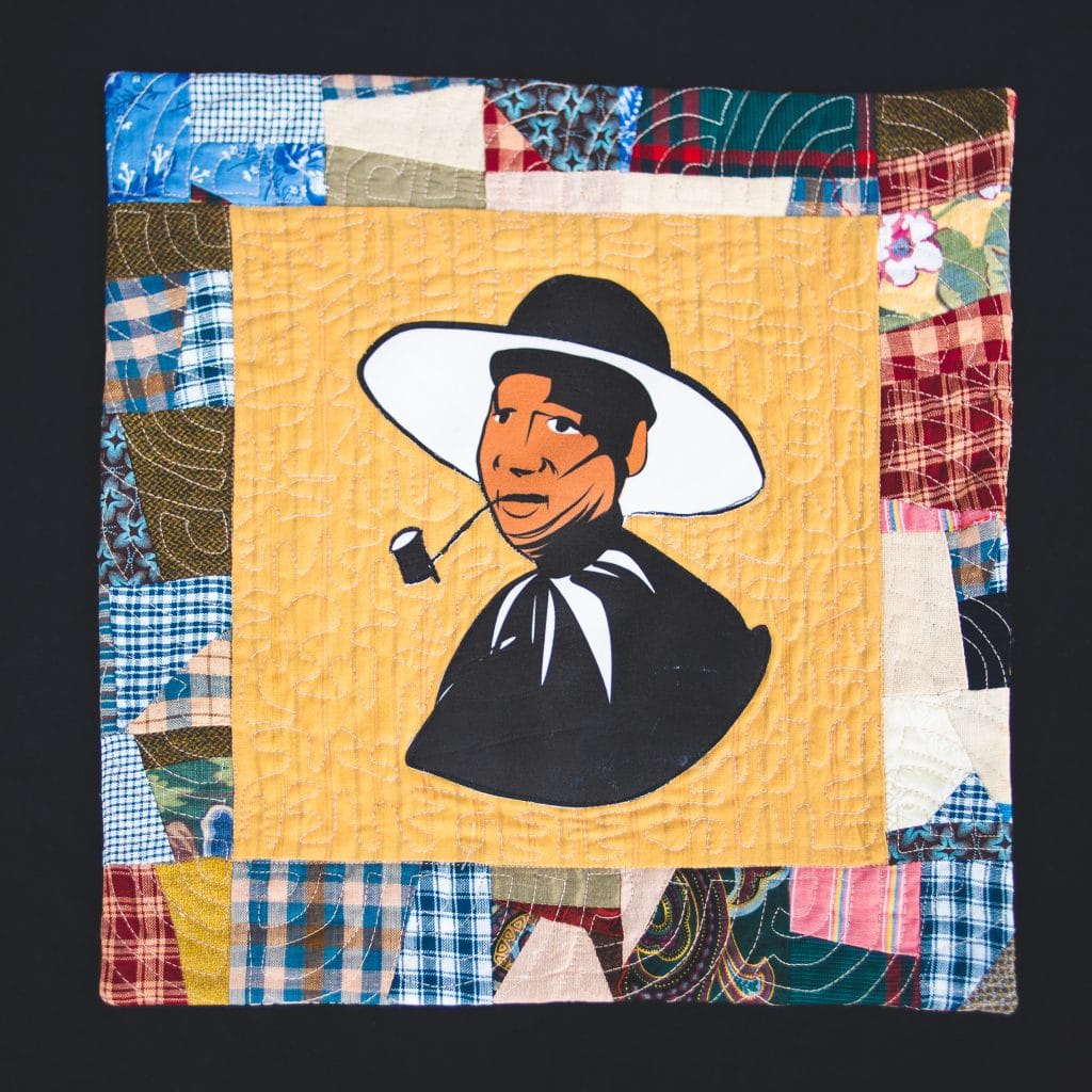 A quilted block depicting Black food pioneer Anthony Johnson.