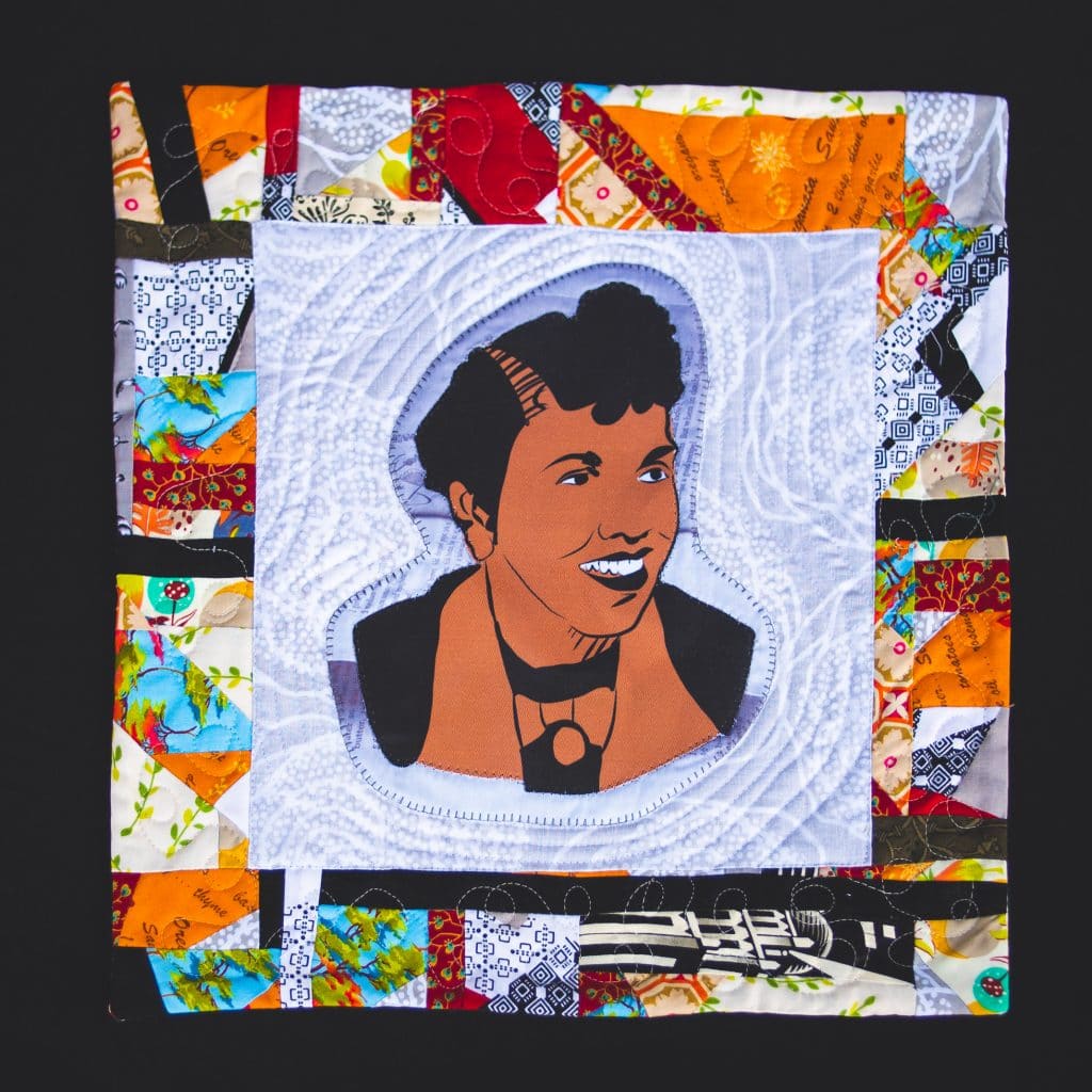 A quilted block depicting Fred DeKnight.