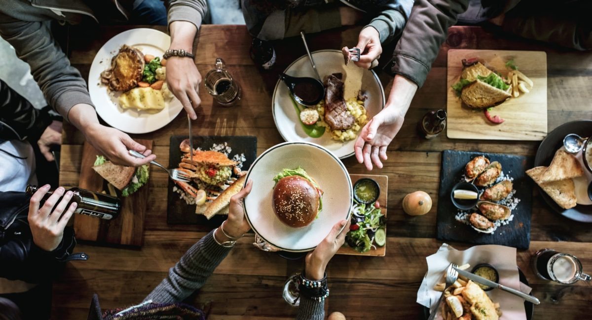 Group of friends eating together